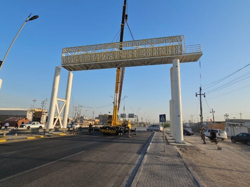 Final positioning of the deck span on the four-column pier portal.